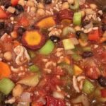 Picture of Instant Pot rainbow chili with ground meet, rainbow carrots, red bell peppers, celery, and tomatoes.