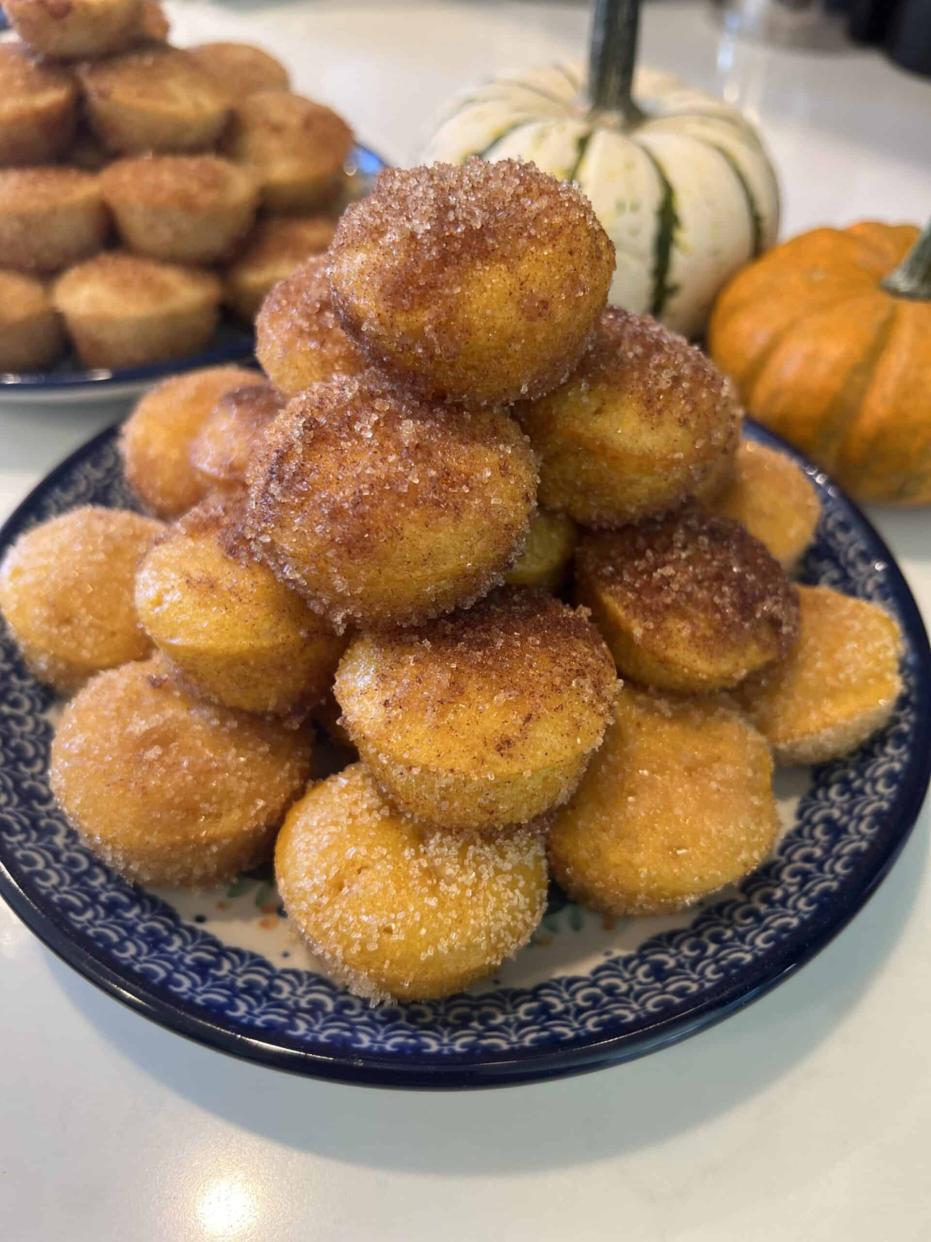 Picture of Pumpkin Cinnamon Sugar Doughnut Holes on a plate.